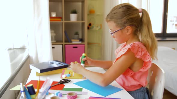 Creative Girl Making Greeting Card at Home