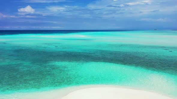 Aerial drone sky of relaxing tourist beach wildlife by aqua blue sea and white sandy background of j