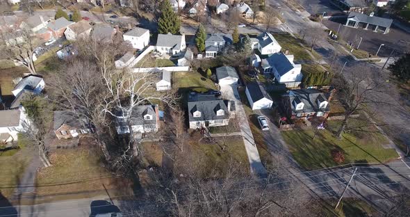 A slowly orbiting aerial view of a typical Ohio residential neighborhood.