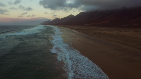 Aerial view of Cofete beach at sunset in the National Park of Jandia.