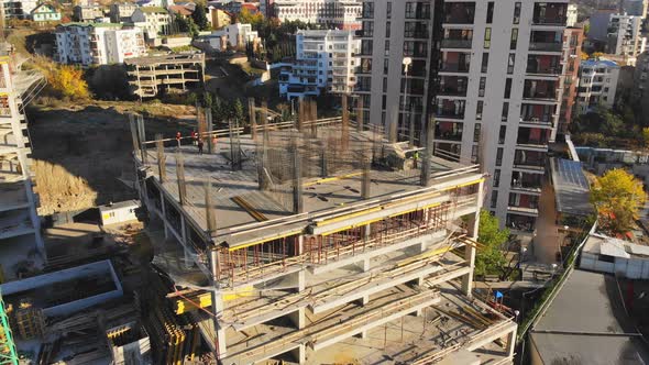 Aerial View Workers Work On Contrcution Site