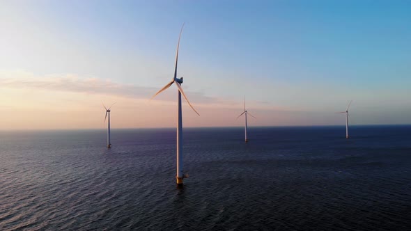 Windmill Park in the Ocean Drone Aerial View of Windmill Turbines Generating Green Energy Electric