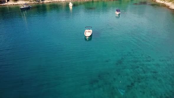 Aerial view of boats anchored at hidden beach, Croatia.