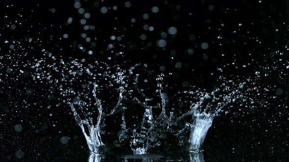 Super Slow Motion Shot of Water Crown Splash at 1000Fps Isolated on Black Background alt