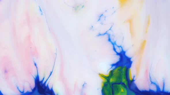 Moving Background Consisting of Blue Red and Green Particles of the Current Paint on a White