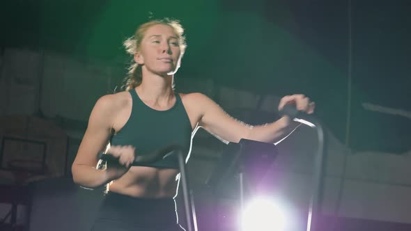 Woman Does Exercises on Treadmill Training Endurance