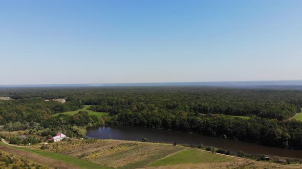 Aerial view of the meadow, forest and lakes.