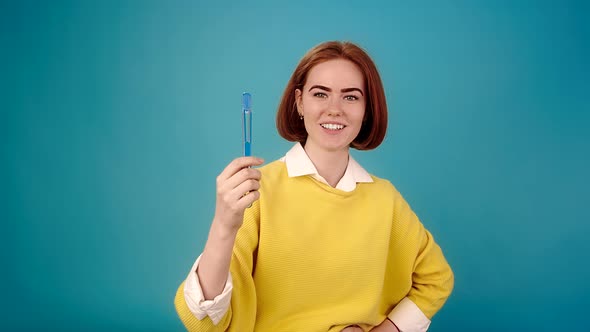 Lady Model Poses with Toothbrush