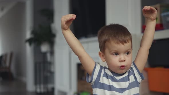 Little Child Kid Boy Talking Emotionally Gesturing Showing High Sign with Hands