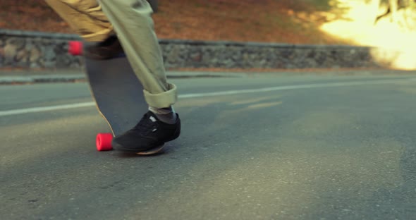 Spinning on a Skate Close-up. Trick on a Longboard.