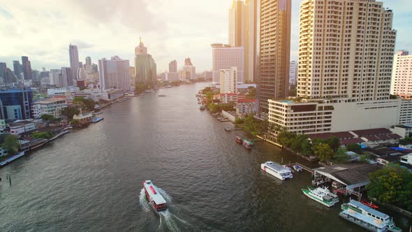 4K UHD : Aerial view over the Chao Phraya River and Buildings