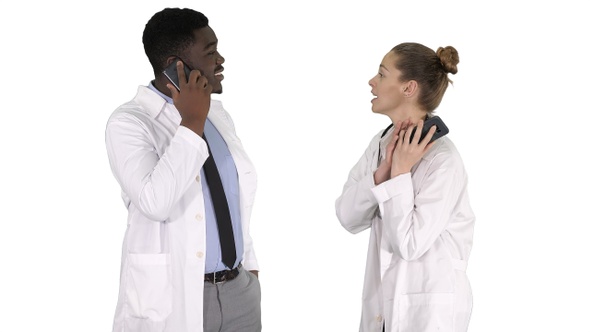 Female and male doctor using mobile phones making calls