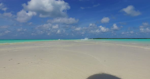 Luxury drone abstract shot of a white sand paradise beach and aqua blue water background in high res