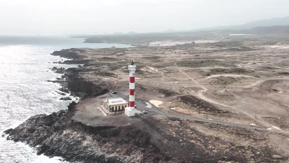 Tenerife Canary Islands Lighthouse at the Atlantic Ocean Alog the Volcanic Cliffs Rocky Coastline