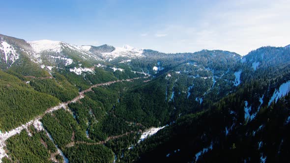 North Cascades Mt Baker Wilderness Forest Trails At Snow Level Heading Towards Mountain Aerial