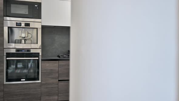 Modern Luxurious Dark Brown Gray and Black Kitchen Details