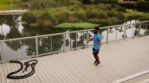 Aerial shot of a man working out in the park