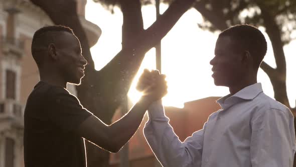 black african people greeting - outdoor - slow motion