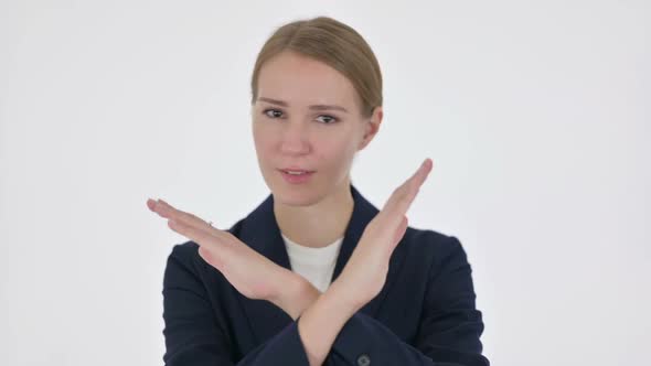 Young Businesswoman Showing No Sign By Arm Gesture on White Background