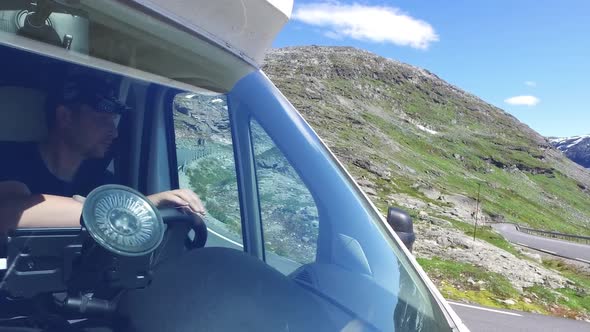 Couple Goes on a Mountain Road in Norway