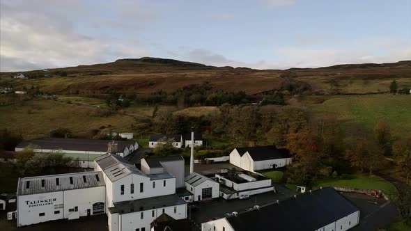 Panning and Lowering Shot of a Scottish Distillery in Skye