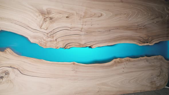 Beautiful Surface of a Wooden Slab Tabletop Filled with Epoxy Resin