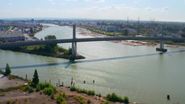 North Arm Canada Line Skytrain Bridge Over The Fraser River Between Richmond And Vancouver - aerial