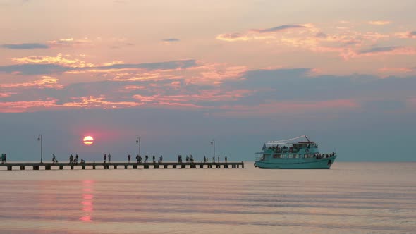 Cinemagraph - Ferry with Passengers Leaving the Pier