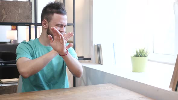 Rejecting, Cross Hands Gesture by Young Man