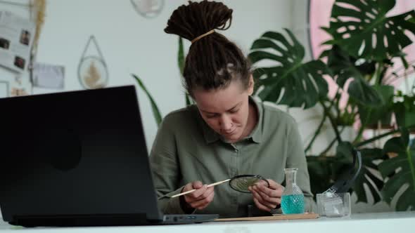 Woman Fixes Glass Plates