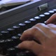A man typing on a typewriter - VideoHive Item for Sale