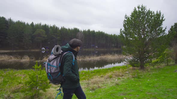 Man with backpack, trekking.