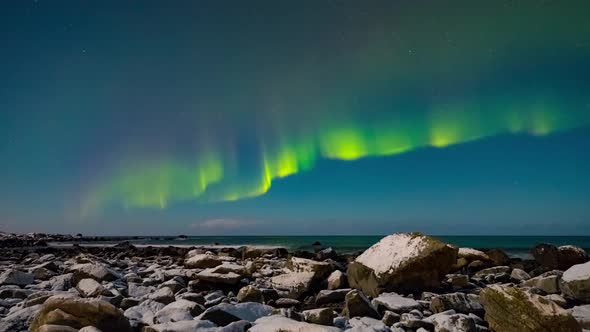 One night in beach of Norwegian sea.watching the stars moving and aurora moving.cold winter night un