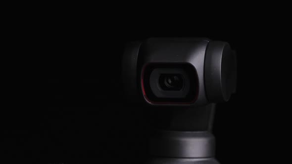 Mechanical Gimbal Camera Lens Rotates on Black Background Robotic Camera Macro