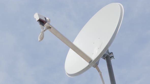 Parbolic type satellite dish antena against blue sky 4k 3840X2160 UltraHD footage - Satellite antenn