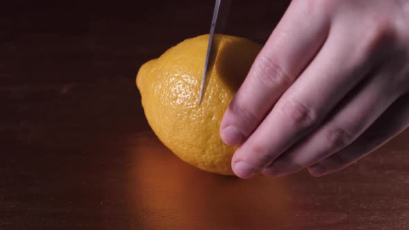 A Hand Holding a Fruit alt