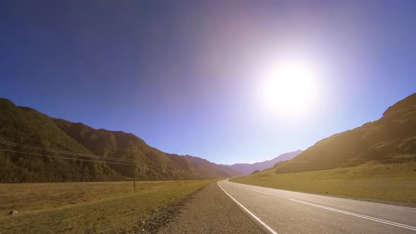 Mountain Road Timelapse at the Summer or Autumn Sunset Sunrise Time