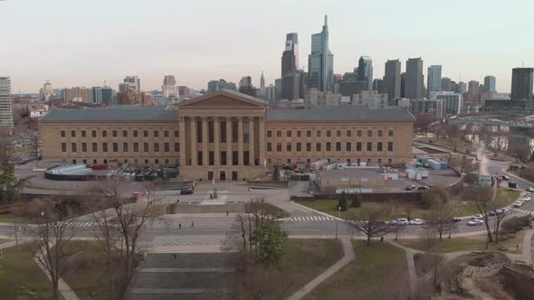 Aerial rising shot over Art Museum in Philadelphia facing downtown skyline