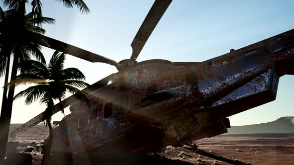 Old Rusted Military Helicopter in the Desert at Sunset