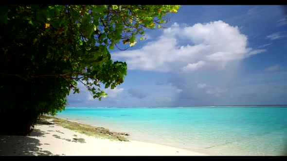 Aerial top down panorama of perfect coast beach lifestyle by blue green ocean and white sandy backgr