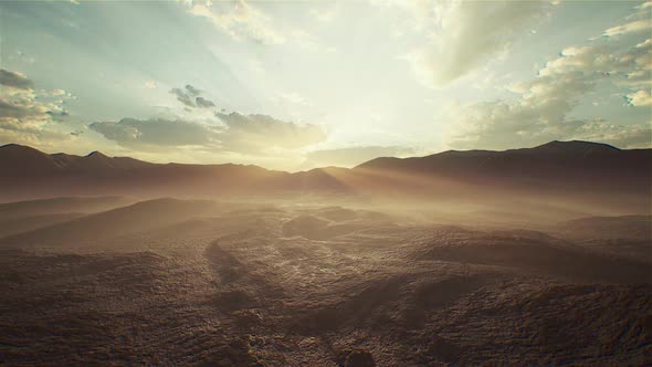 Sunset and Dry Ground Landscape