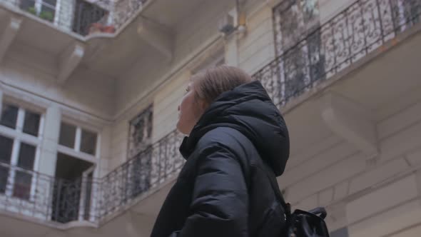 Girl On Well Courtyard