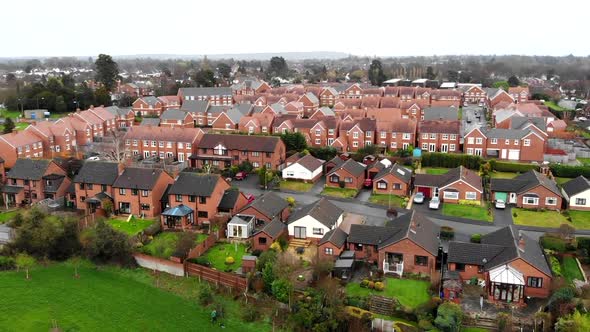 Aerial - A residential of Shrewsbury, a cold day with a view above the houses from the sky in a smal