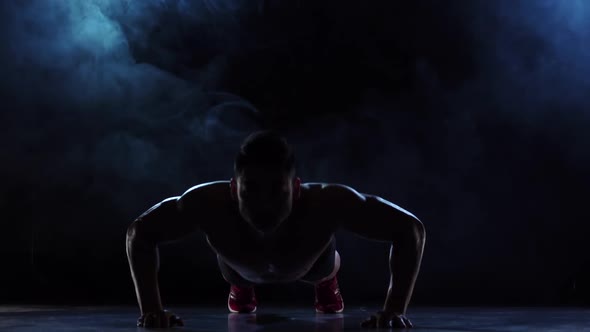 Silhouette Bodybuilder Push Ups, Black Background Slow Motion