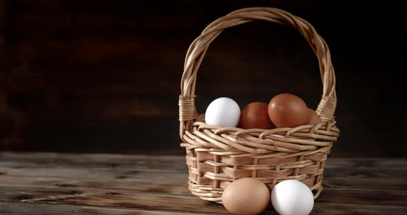 The Basket of Raw Eggs Slowly Rotates on the Table. 