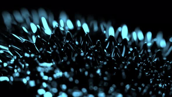 Super Slow Motion Macro Shot of Magnetic Liquid Ferrofluid in Motion at 1000Fps.