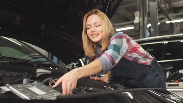 Puzzled Girl Have Problems with Engine