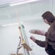 Young Girl Draws on Canvas - VideoHive Item for Sale