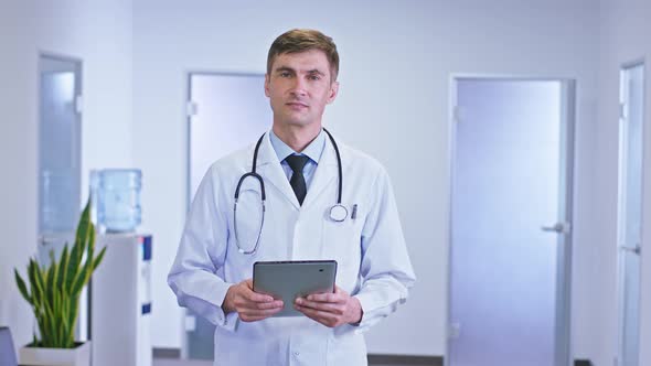 Modern Hospital Corridor Portrait of a Doctor Man