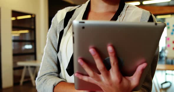 Businesswoman using digital tablet